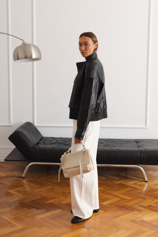 Cream Leather Handbag with Flap and Decorative Straps